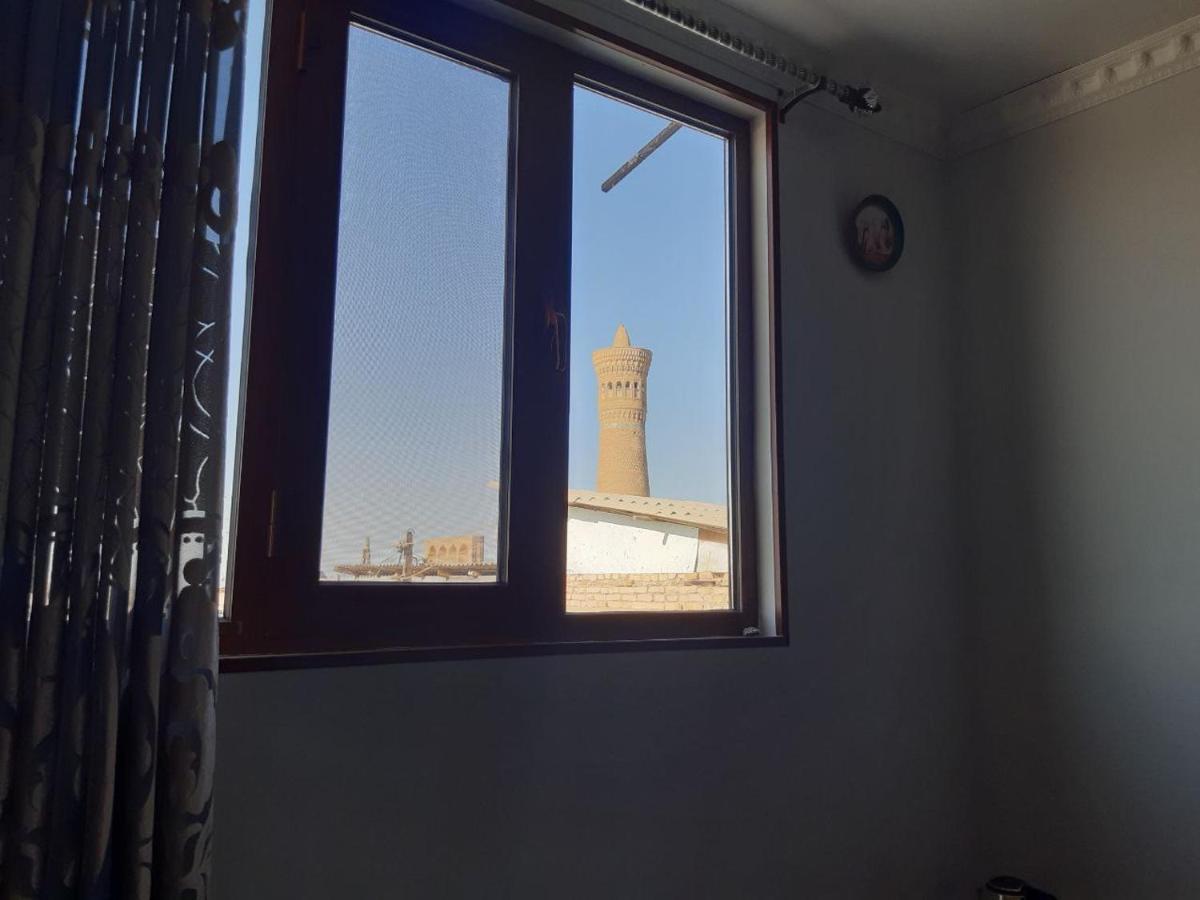 Hotel Rizqiro'Z Boutique بخارى الغرفة الصورة